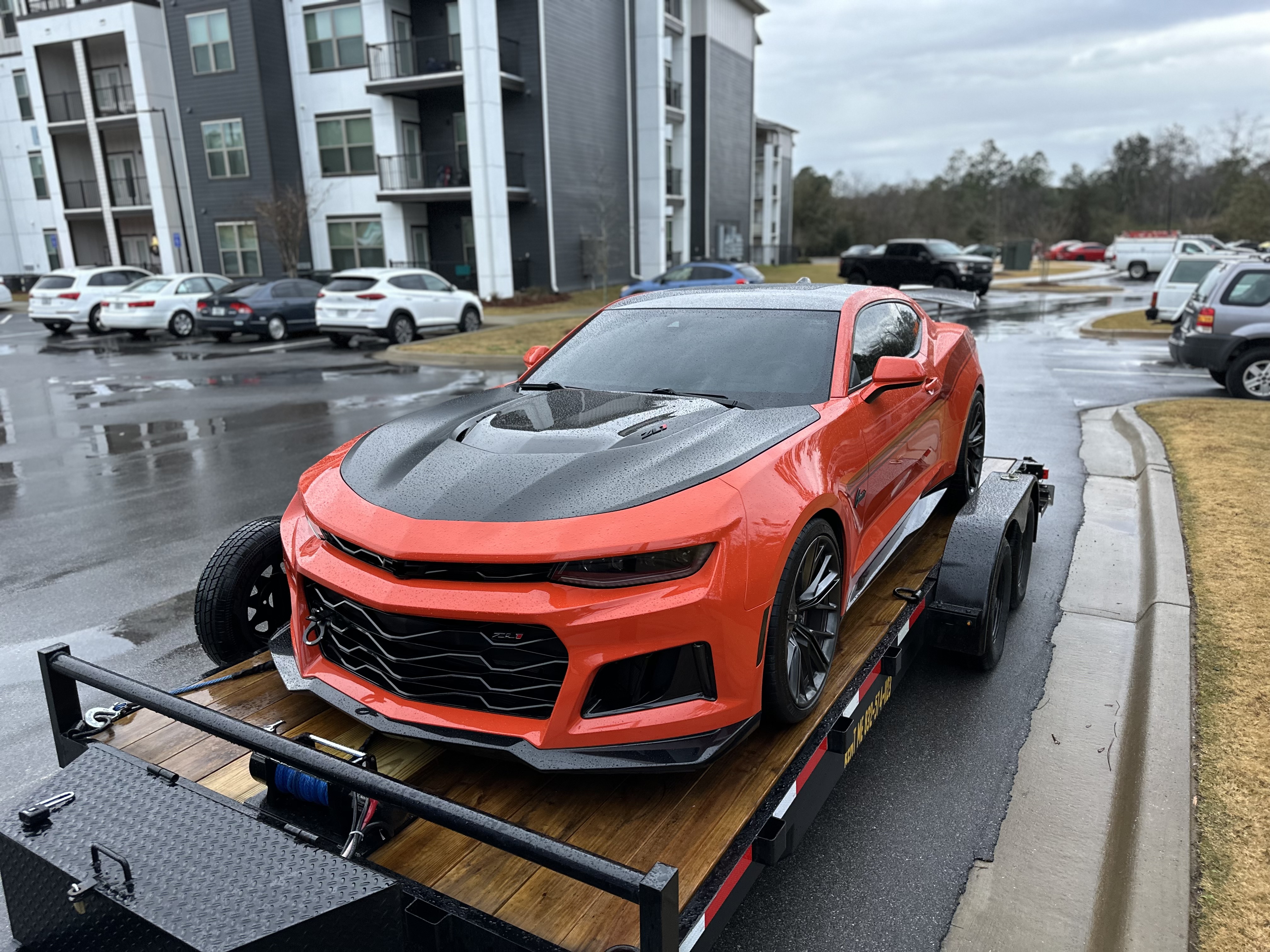 Car hauler trailer transporting Camaro - FastTrack Trailers vehicle transport service
